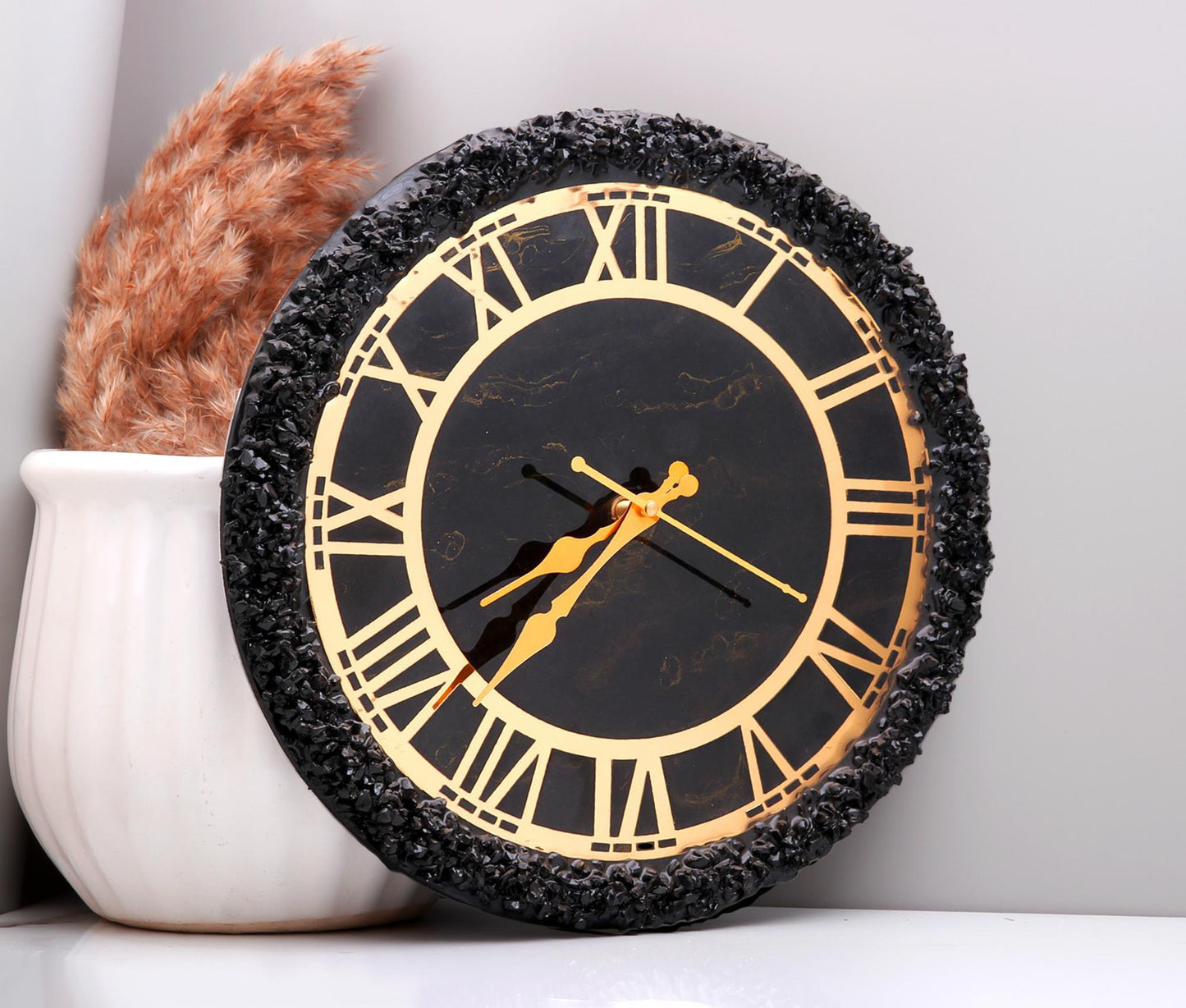 Royal Noir Golden Resin Wall Clock with Black Stones