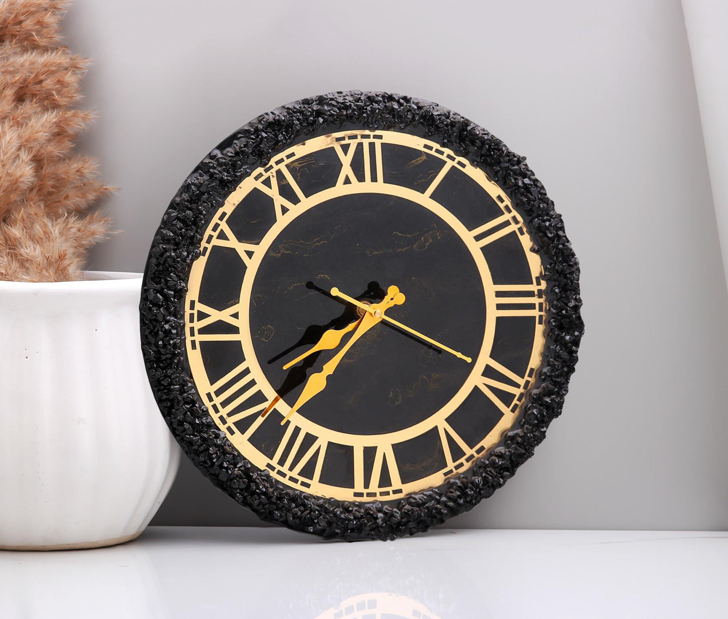 Royal Noir Golden Resin Wall Clock with Black Stones
